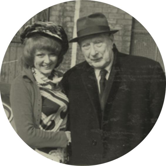 Photograph of artist Liz Taylor-Webb with L. S. Lowry
